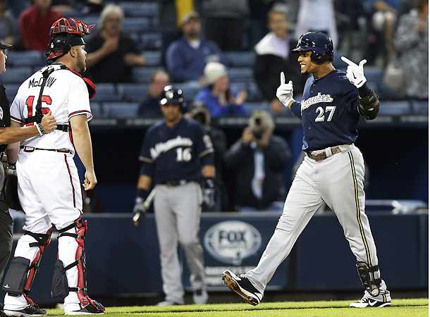Brian McCann (left) took serious exception to Carlos Gomez's response after hitting a home run. (AP)